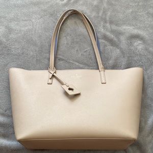 Cream colored Kate Spade never full bag